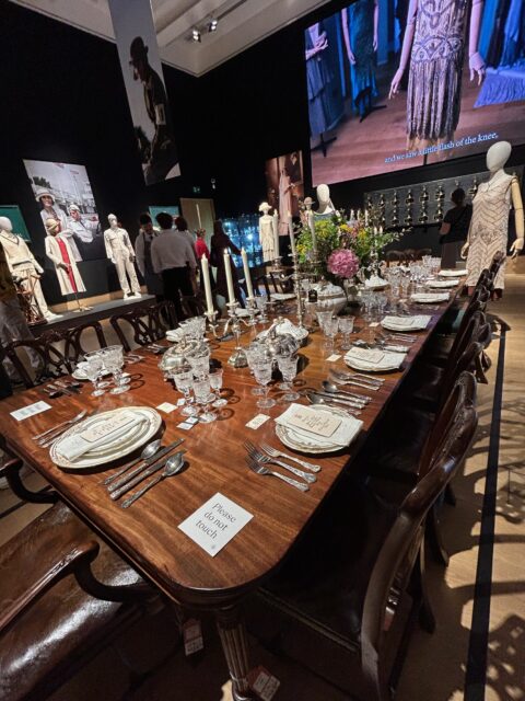 The Downton Abbey dining service and table on display at Bonhams' Downton Abbey auction.