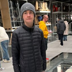 The interior of the V&A East Storehouse with exposed shelves and flooring.