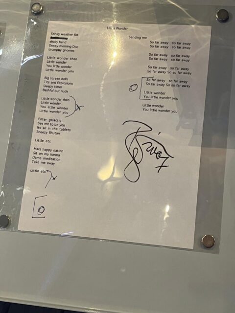 Signed Little Wonder lyric sheet.
