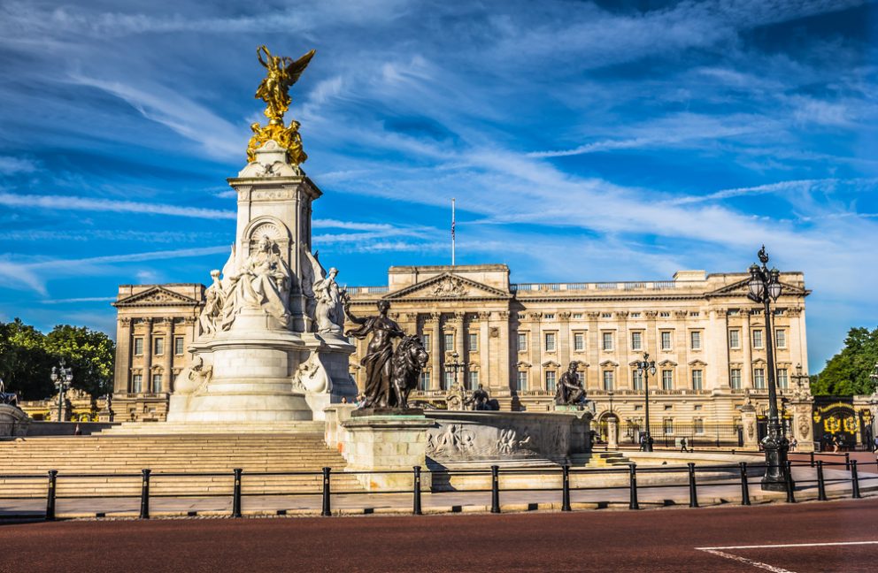 The exterior of Buckingham Palace with the Victoria Memorial in the foreground